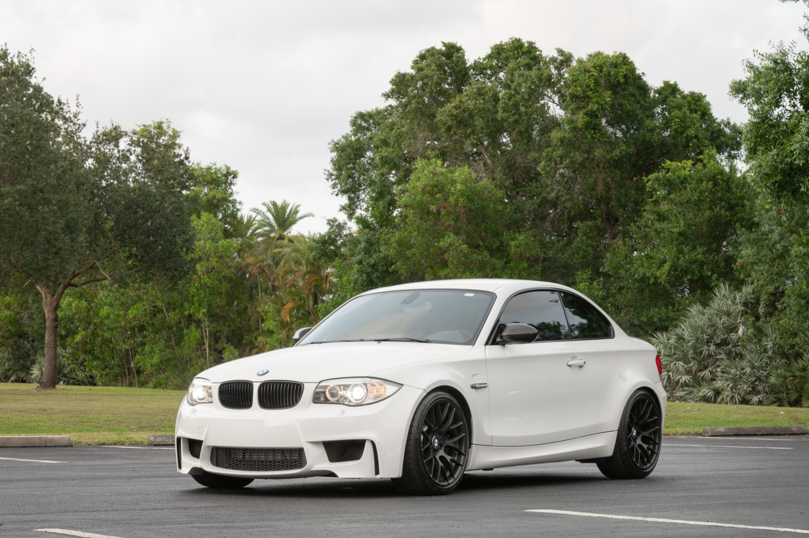 2011 BMW 1-Series M Coupe in Alpine White 3 over Black Boston Leather with Orange Stitching