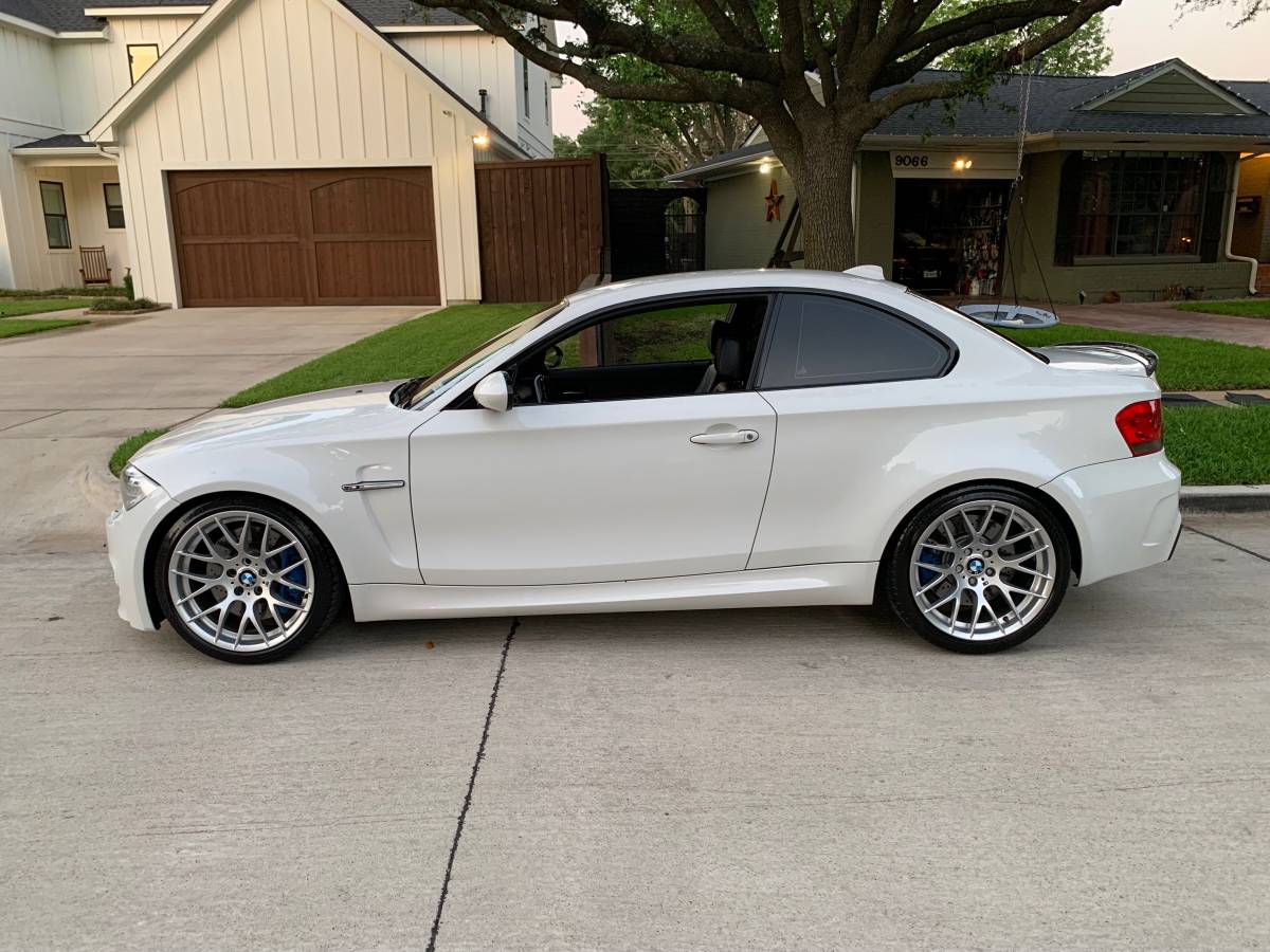 2012 BMW 1-Series M Coupe in Alpine White 3 over Black Boston Leather with Orange Stitching