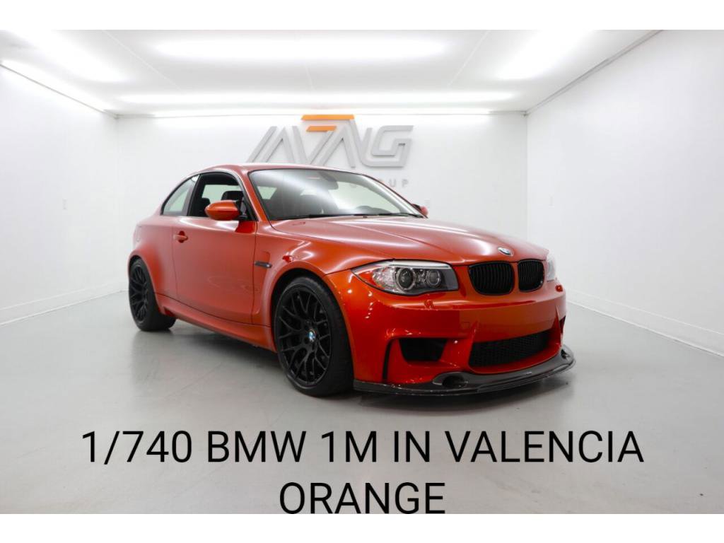 2011 BMW 1-Series M Coupe in Valencia Orange Metallic over Black Boston Leather with Orange Stitching